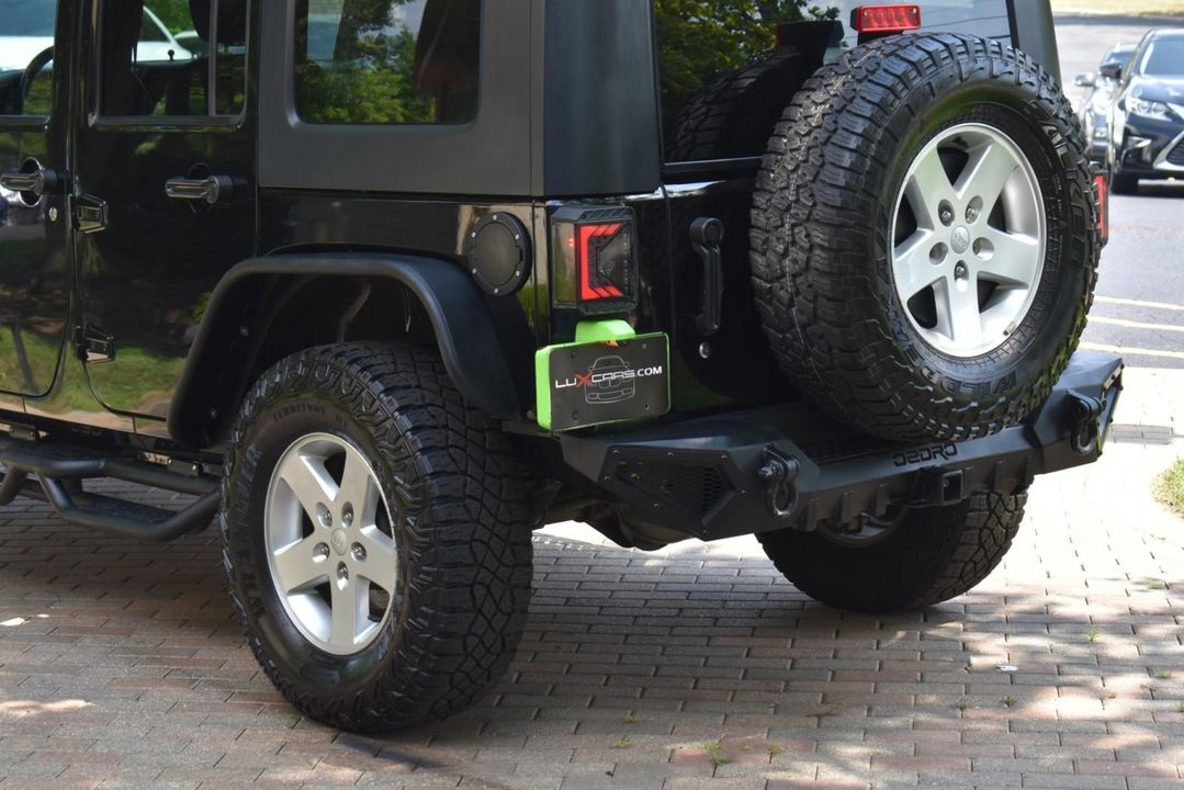 2015 Jeep Wrangler Unlimited Sport w/Engine: 3.6L V6 24V VVT and Transmission: 6-Spee