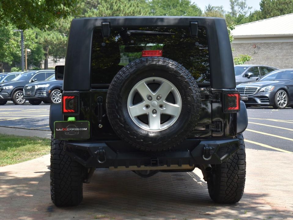 2015 Jeep Wrangler Unlimited Sport w/Engine: 3.6L V6 24V VVT and Transmission: 6-Spee