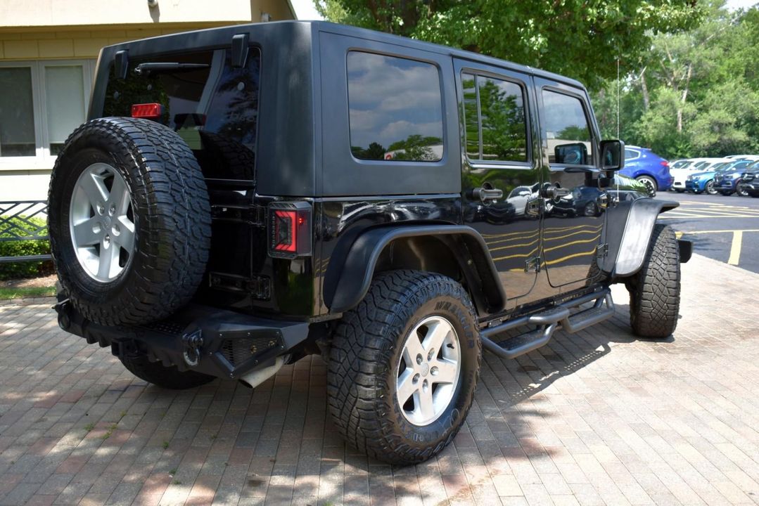 2015 Jeep Wrangler Unlimited Sport w/Engine: 3.6L V6 24V VVT and Transmission: 6-Spee
