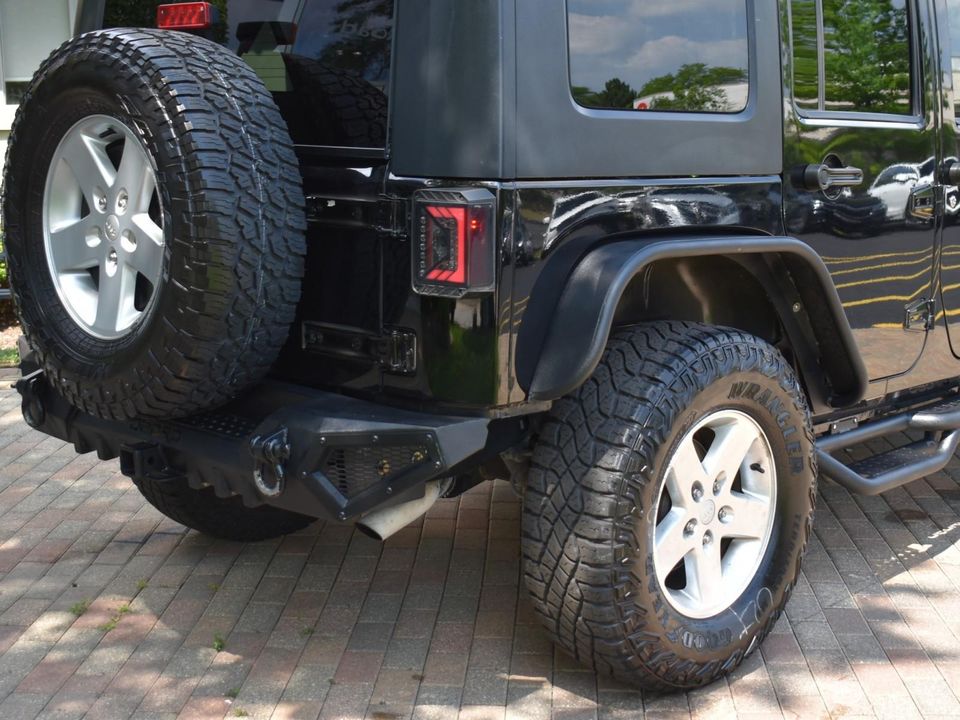 2015 Jeep Wrangler Unlimited Sport w/Engine: 3.6L V6 24V VVT and Transmission: 6-Spee