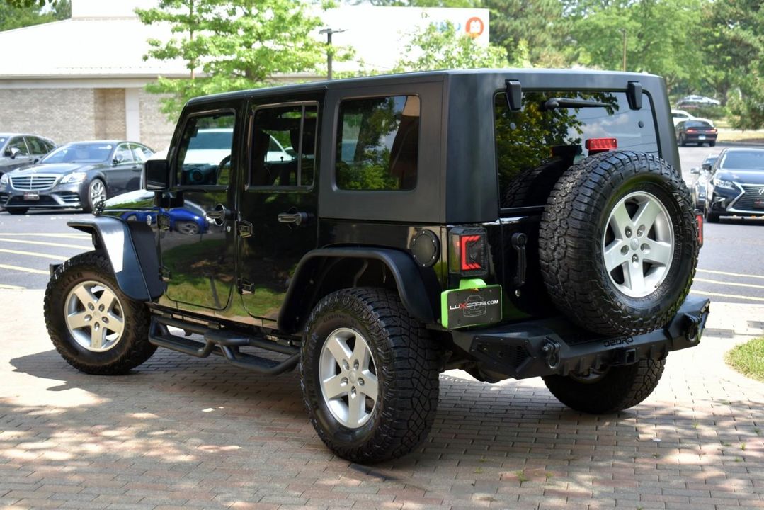 2015 Jeep Wrangler Unlimited Sport w/Engine: 3.6L V6 24V VVT and Transmission: 6-Spee